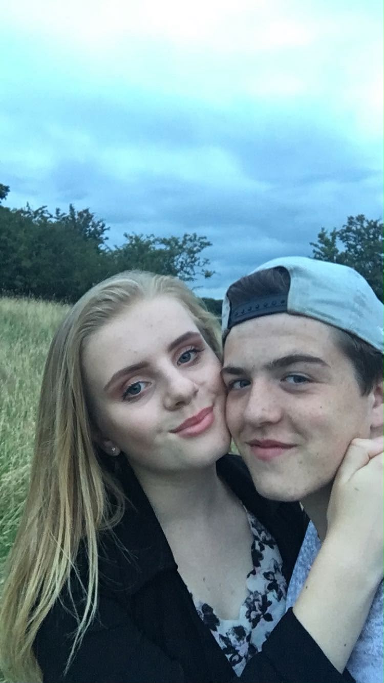 Matthew and Romany as teenagers in a field