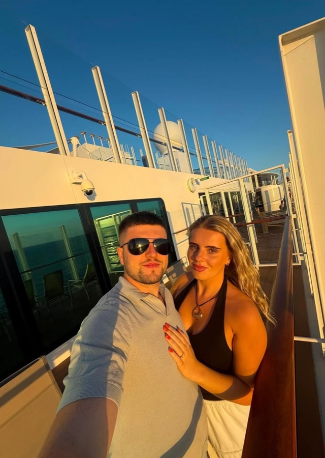 Matthew and Romany on a cruise at golden hour